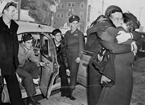 Serviceman Greeted by Mother