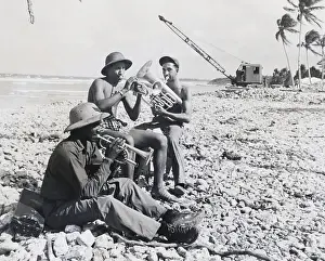 Horn Prints: Three Servicemen Play Instruments/Beach