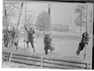 Challenge Prints: Servicemen Training on Obstacle Course