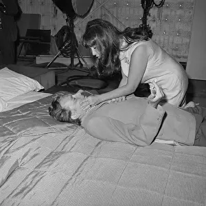 Prints of (Original Caption). Hollywood, CA.: Elizabeth Taylor and Richard Burton begin rehearsals 7/14 under the watchful eye of director Mike Nichols, for Who's Afraid of Virginia Woolf?, at the Warner Bros A Visual Odyssey Through Glamour and Stardom: On the Set of Who's Afraid of Virginia Woolf?