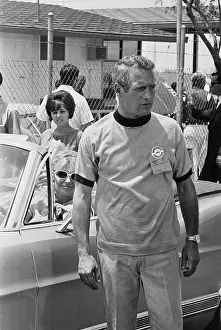 Prints of American actress Joanne Woodward sits in a car, beside American actor Paul Newman, on the set of Winning, filmed at the Riverside International Raceway in Moreno Valley, California, August 1968 Paul Newman: A Life in Frames: On The Set Of Winning