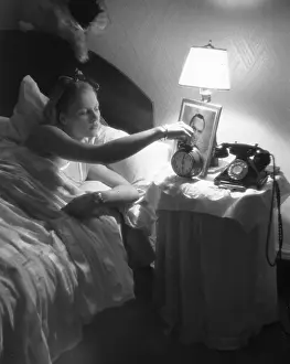 Telephone Prints: Setting Her Alarm