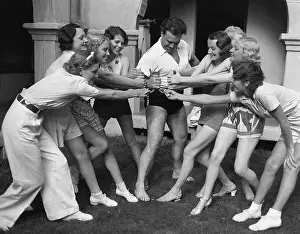 Weightlifting Prints: Seven Models Pulling One Man