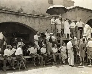 Seven Movie Cameras Lined/Wall; Filming