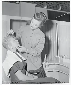 Sex Changed Artist Applying Makeup to Customer