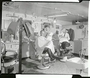 Bill Sexton Sitting in Barber's Chair