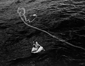 Minnesota Prints: Sgt. Karl E. Wright Being Rescued From One-man Dinghy