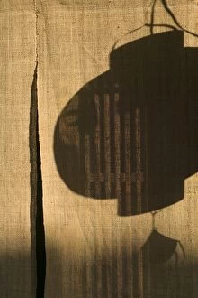 Images Dated 15th November 2004: Shadow of lantern outside restaurant, Kyoto, Honshu, Japan