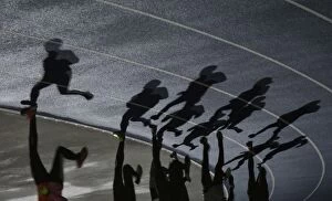Images Dated 3rd February 2016: Shadows of a group of runners