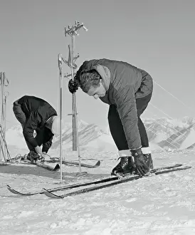 The Shah of Iran Adjusting His Skis
