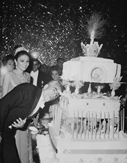 Farah Diba Prints: Shah of Iran Blowing Out Birthday Cake Candles