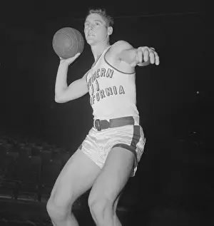 Bill Sharman Holding Basketball