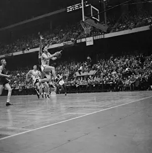 Bill Sharman Jumping to Make a Basket