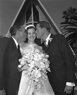 Sharon Mae Disney Receiving Kisses on Wedding Day