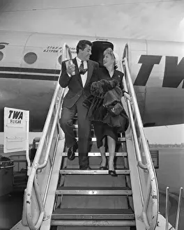 Shelley Winters and Farley Granger Walking down Airplane Steps