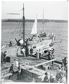 Ship Crew Preparing Airplanes for Use