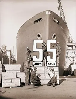 Goals Prints: Shipbuilders Set Up Sign at Shipyard