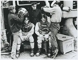 Shipmen Preparing Divers to Search for Missing Wreckage