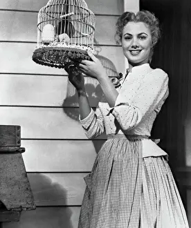 Shirley Jones Holding a Birdcage