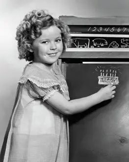 Shirley Temple Drawing On Blackboard