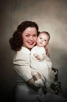 Shirley Temple Holding her Baby