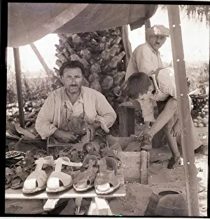 Shoemaker Prints: Shoemaker Working in Outdoor Shop