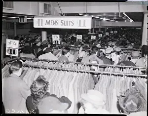 On Sale Prints: Shoppers Crowd Store for $11 Suits and Coats