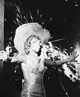 Splashing Prints: Showgirl Getting Hit with a Pie