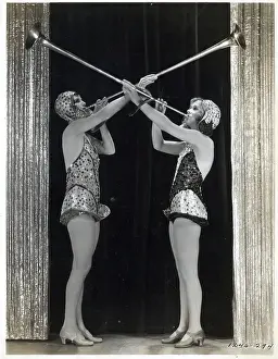 Showgirls Playing Long Horns