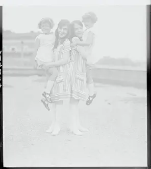 Siamese Twins Holding Prize Winning Twins
