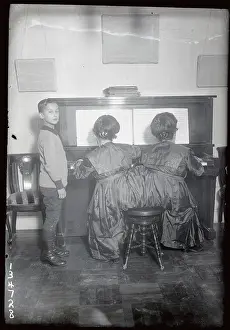 Siamese Twins Playing the Piano