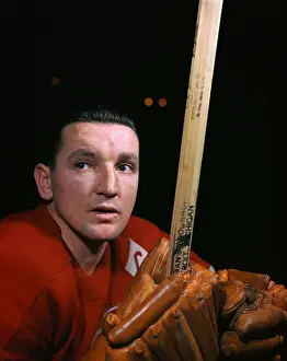 Sid Abel Posing with Hockey Gear