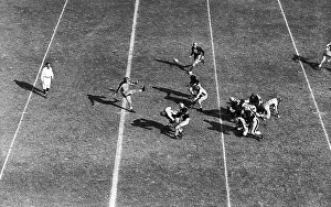 Sid Luckman Punting