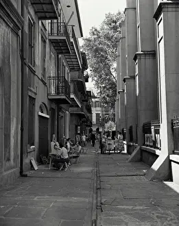 Urban Prints: Sidewalk artists in Pirates Alley in New Orleans Louisiana