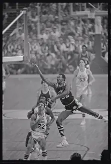 Sidney Moncrief with Basketball in Mid Air