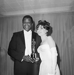 Sidney Poitier with Anne Bancroft at Oscars