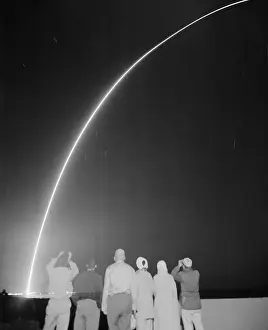 Sightseers Gazing at Missile Launch