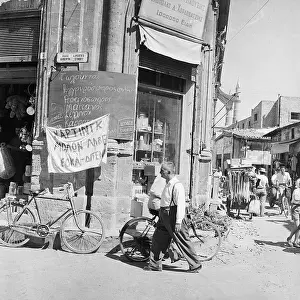 Nicosia Prints: Sign Hanging On The Front Of A Store