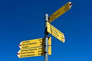 Signposts for hiking routes at the Cabane des Audannes, Bernese Alps, Canton of Valais, Switzerland