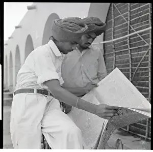 Unemployed People Prints: Sikh Men Search Newspaper For Jobs