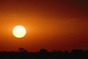 Images Dated 28th November 2006: Silhouette of an African Landscape Under a Dramatic Sunset