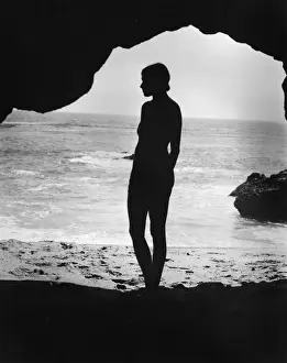 Silhouette On Beach