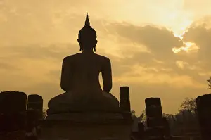 Wat Mahathat Prints: Silhouette of buddha statue at sunset, Thailand
