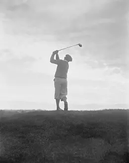 Silhouette of Golfer Swinging Club