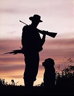 Images Dated 18th October 2005: Silhouette Of Man Hunter