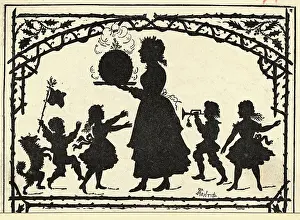 Sillhouette Of A Family At Christmas