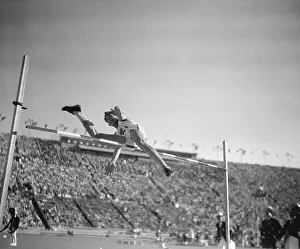 Simeon G. Toribio Going Over High Bar