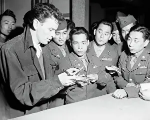 Autographing Prints: Sinatra Signing Auotgraphs for Nisei GIs