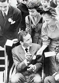 Autographing Prints: Sinatra Signs Autographs For Women