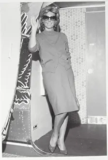 Singer Julie London Waving from Airplane
